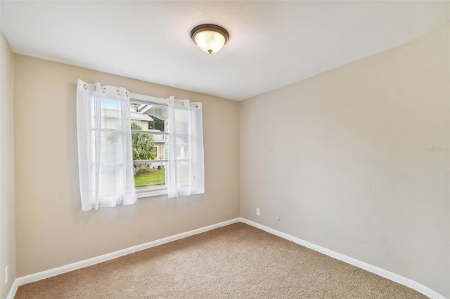 unfurnished room with carpet