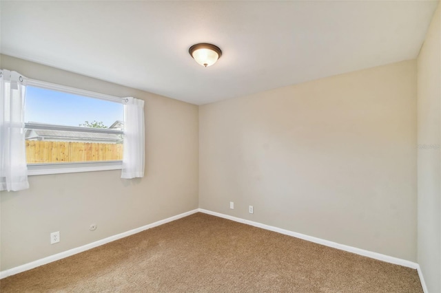 empty room with carpet floors