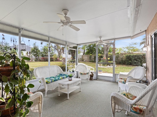 sunroom featuring plenty of natural light and ceiling fan