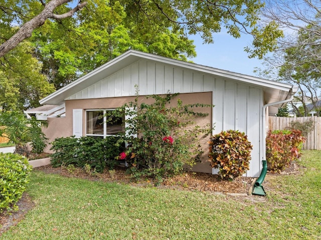 view of property exterior featuring a yard