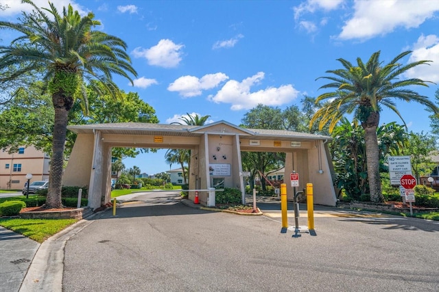 exterior space with a carport