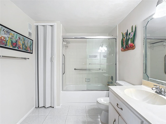 full bathroom featuring enclosed tub / shower combo, toilet, tile floors, and large vanity