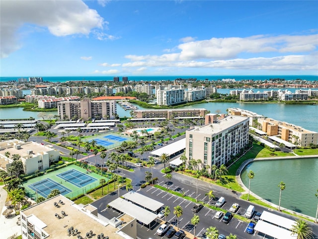 birds eye view of property with a water view