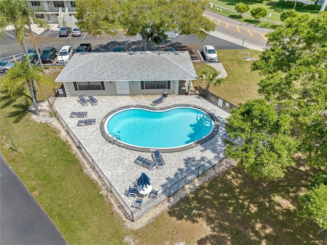 view of swimming pool with a patio area