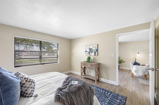 bedroom featuring light hardwood / wood-style flooring