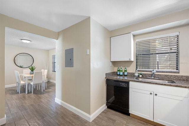 kitchen featuring dishwasher, a healthy amount of sunlight, light wood-type flooring, white cabinetry, and sink