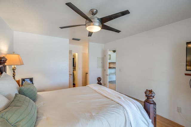 bedroom featuring hardwood / wood-style flooring and ceiling fan