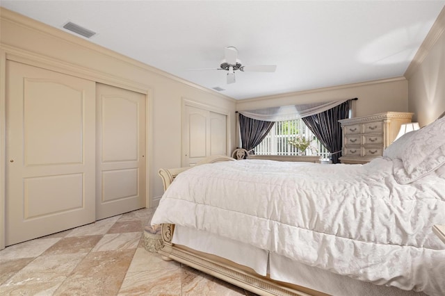 bedroom featuring ceiling fan and crown molding