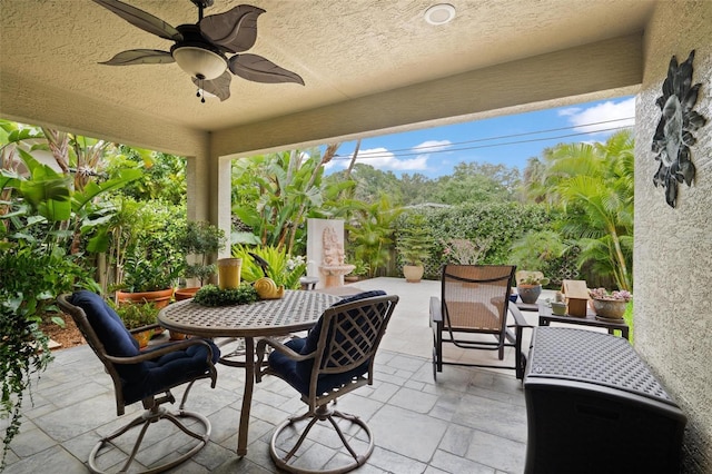 view of patio / terrace with ceiling fan