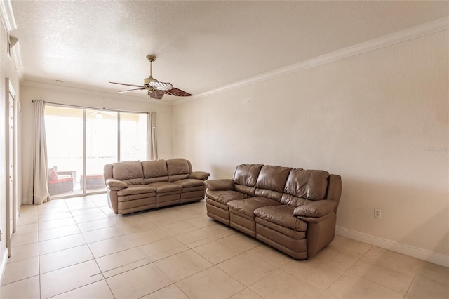 living room featuring crown molding, ceiling fan, a textured ceiling, and light tile flooring