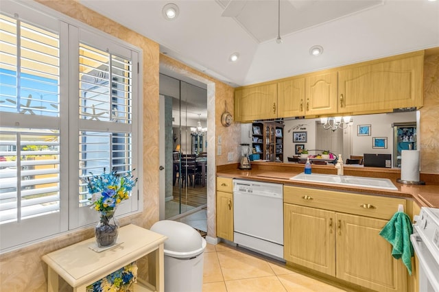 kitchen with range, a chandelier, sink, dishwasher, and light tile floors