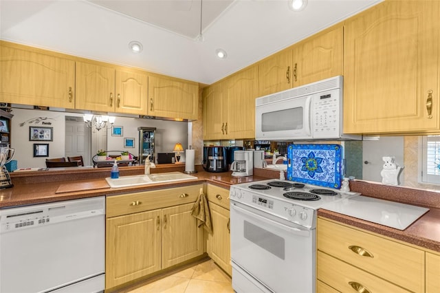 kitchen with white appliances, light brown cabinetry, backsplash, light tile floors, and sink