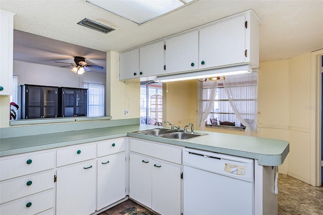 kitchen with white cabinets, kitchen peninsula, ceiling fan, and dishwasher