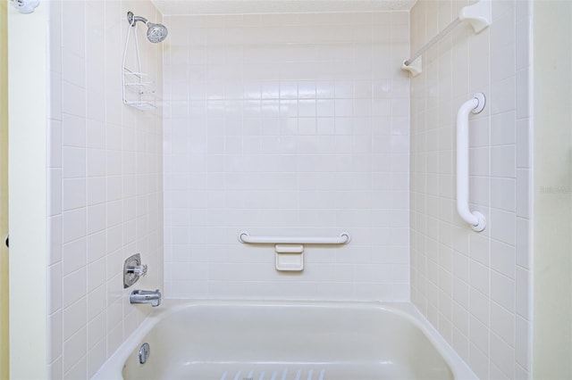 bathroom featuring tiled shower / bath combo