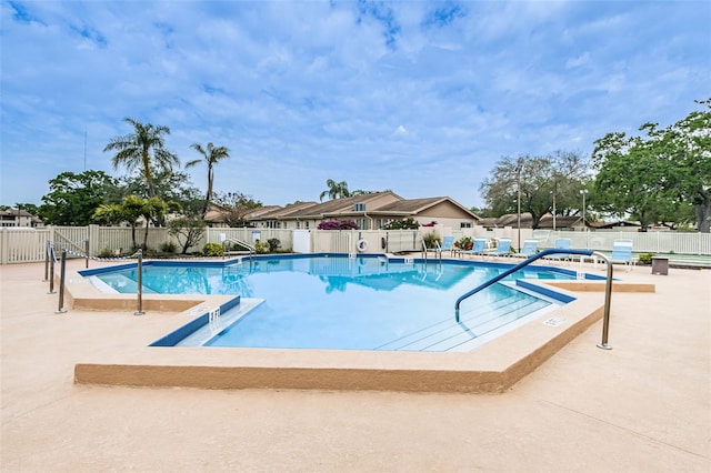 view of pool featuring a patio area