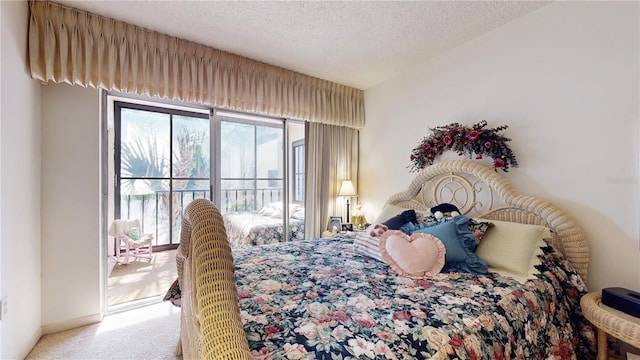 2205 Belleair Rd Unit A13, Clearwater, FL 33764 - carpeted bedroom with access to exterior and a textured ceiling