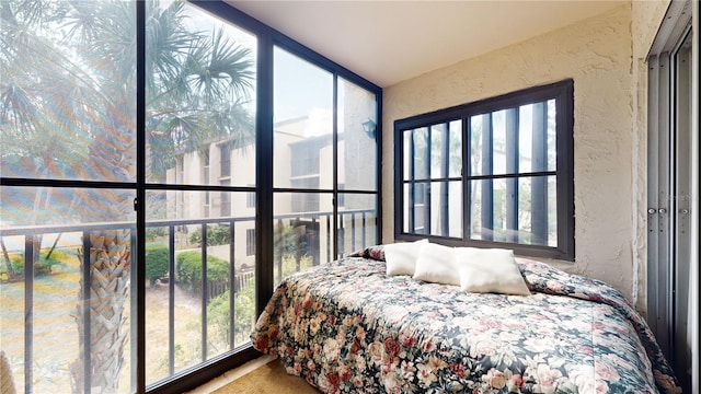 2205 Belleair Rd Unit A13, Clearwater, FL 33764 - bedroom with a textured wall