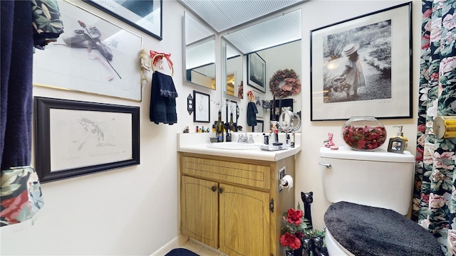 2205 Belleair Rd Unit A13, Clearwater, FL 33764 - bathroom featuring vanity and toilet