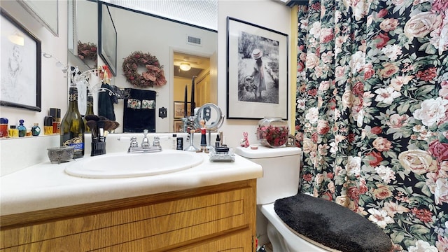 2205 Belleair Rd Unit A13, Clearwater, FL 33764 - bathroom with toilet and vanity