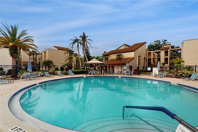 2205 Belleair Rd Unit A13, Clearwater, FL 33764 - community pool with a patio and a residential view