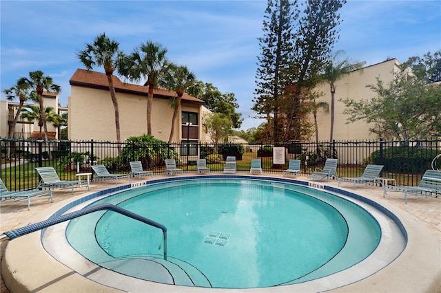 2205 Belleair Rd Unit A13, Clearwater, FL 33764 - view of swimming pool featuring a patio area