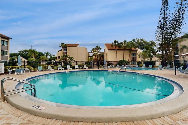 2205 Belleair Rd Unit A13, Clearwater, FL 33764 - view of swimming pool with a patio area