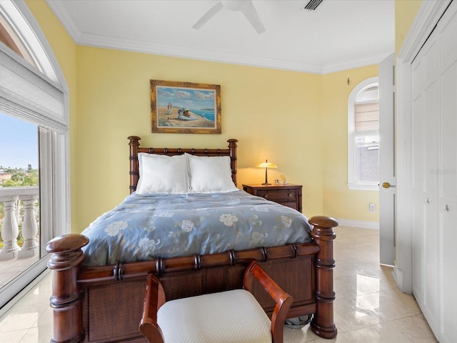 bedroom with light tile flooring, ornamental molding, a closet, and ceiling fan