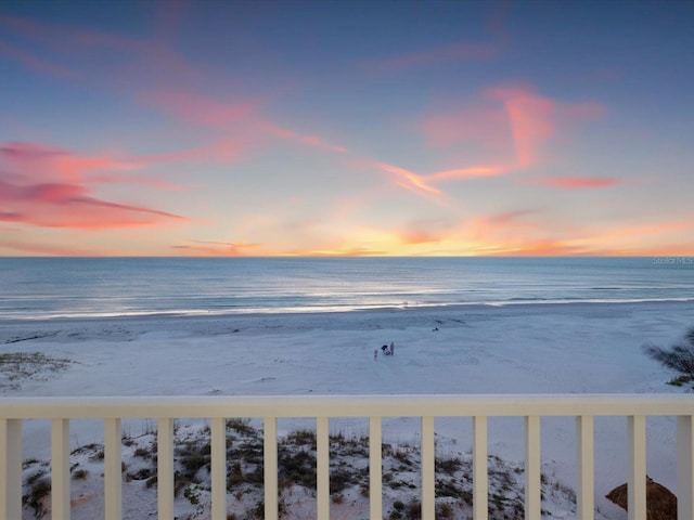 property view of water featuring a beach view