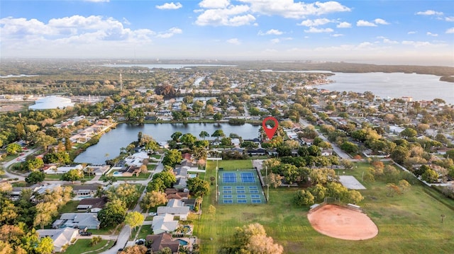 bird's eye view with a water view