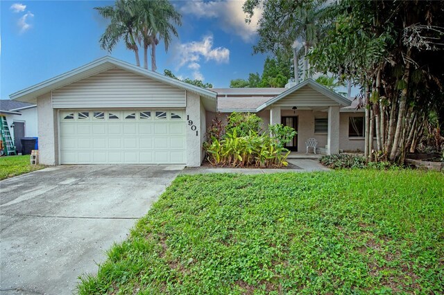 single story home featuring a garage