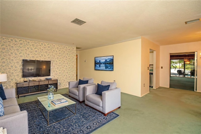 living room featuring ornamental molding, a textured ceiling, and carpet flooring