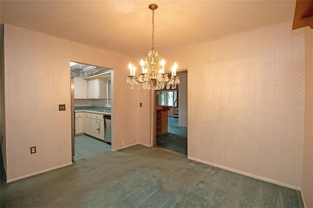 unfurnished dining area with carpet flooring, sink, and a chandelier