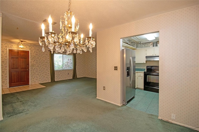 unfurnished dining area featuring light colored carpet and a textured ceiling