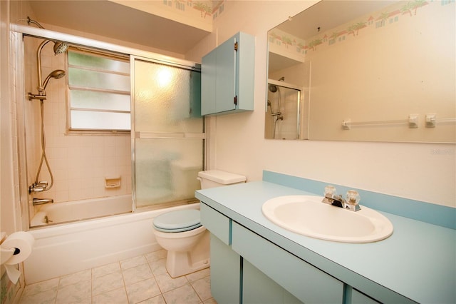 full bathroom with tile patterned flooring, enclosed tub / shower combo, vanity, and toilet