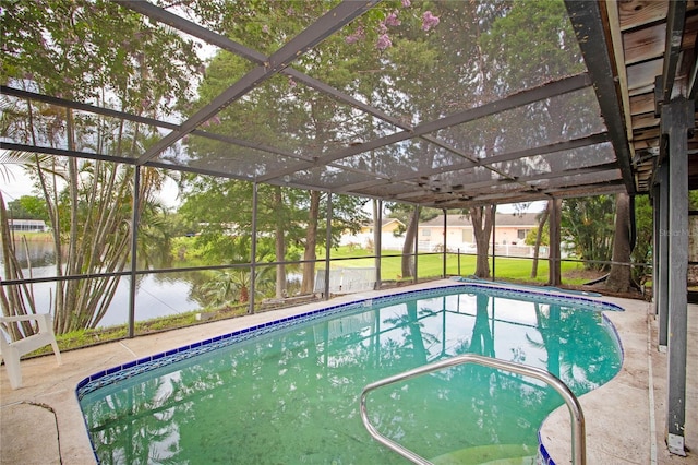 view of pool featuring a water view, a lanai, and a patio area