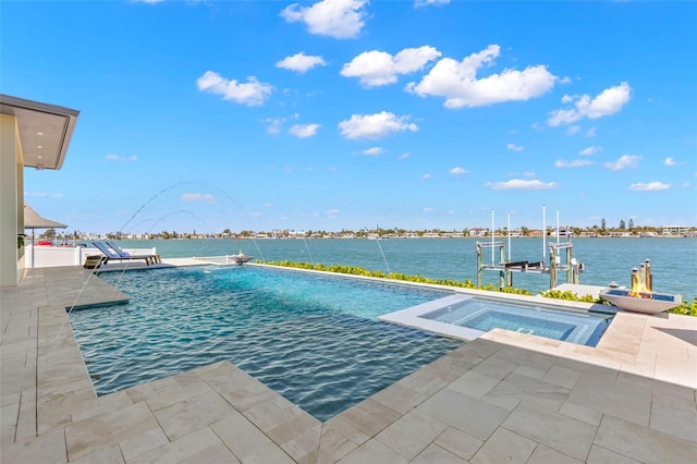 view of swimming pool featuring an in ground hot tub and a water view