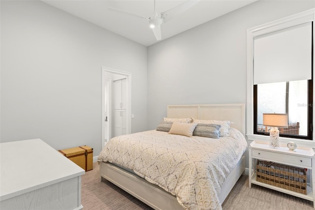 bedroom with ceiling fan and carpet