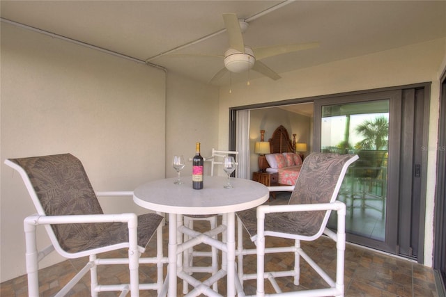 interior space featuring ceiling fan