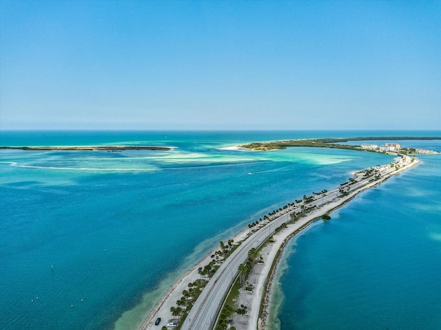 bird's eye view featuring a beach view and a water view