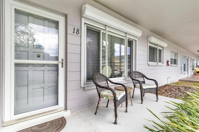 doorway to property with a porch