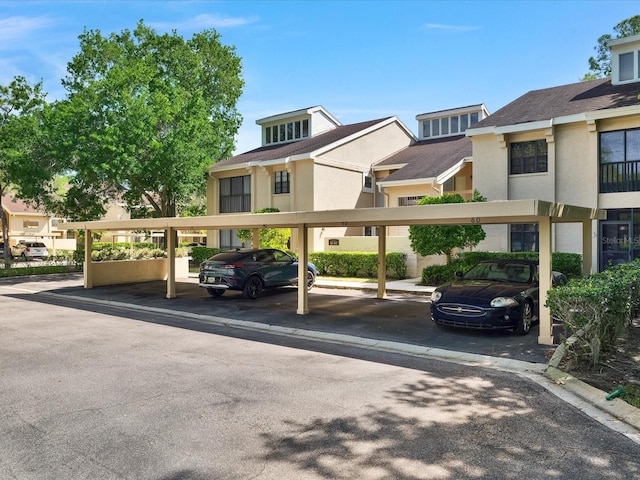 view of car parking with a carport