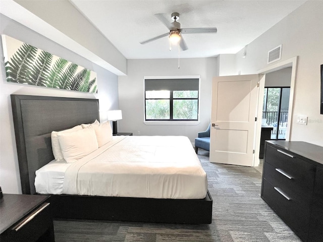 carpeted bedroom with ceiling fan