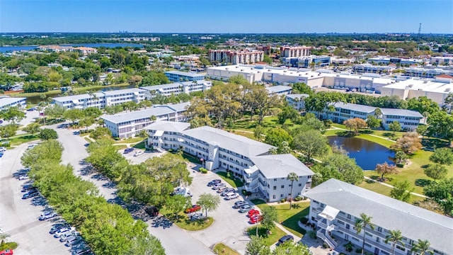 drone / aerial view with a water view