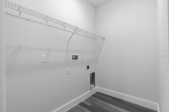 laundry room with dark hardwood / wood-style flooring, electric dryer hookup, and washer hookup