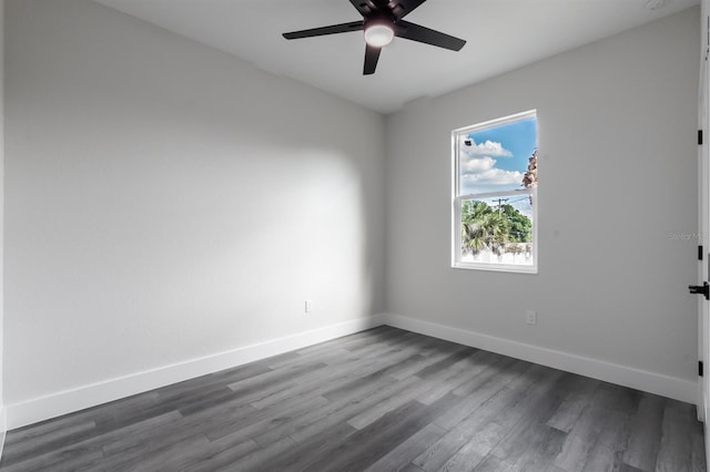 empty room with hardwood / wood-style flooring and ceiling fan