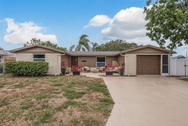 ranch-style home with a garage