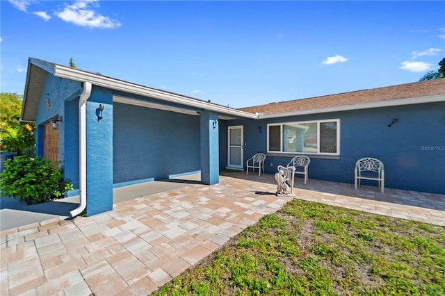 exterior space with a patio