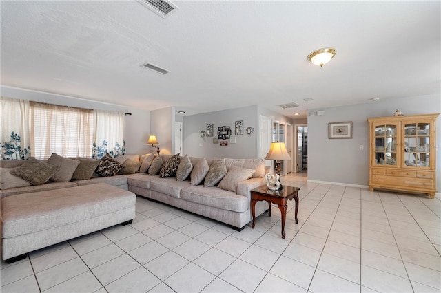 living room with light tile flooring