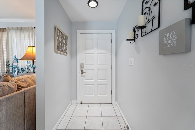 doorway with light tile flooring