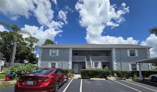 view of building exterior featuring a carport